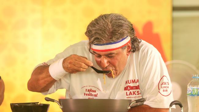 Loukas Gikopoulos in the Man V Laksa event of the 2022 Laksa Festival Picture: Glenn Campbell