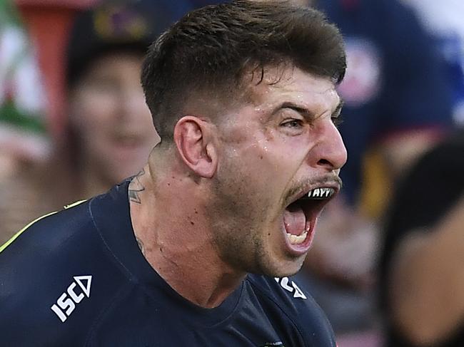 BRISBANE, AUSTRALIA - MAY 15: Curtis Scott of the Raiders celebrates with team mates after scoring a try during the round 10 NRL match between the Canterbury Bulldogs and the Canberra Raiders at Suncorp Stadium, on May 15, 2021, in Brisbane, Australia. (Photo by Albert Perez/Getty Images)