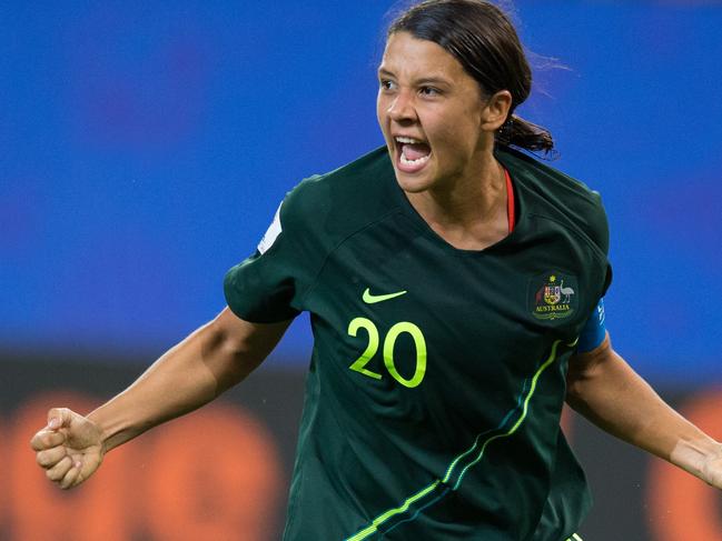 GRENOBLE, FRANCE - JUNE 18: Sam Kerr of Australia celebrates scoring her side's and her own fourth goal during the 2019 FIFA Women's World Cup France group C match between Jamaica and Australia at Stade des Alpes on June 18, 2019 in Grenoble, France. (Photo by Craig Mercer/MB Media/Getty Images)