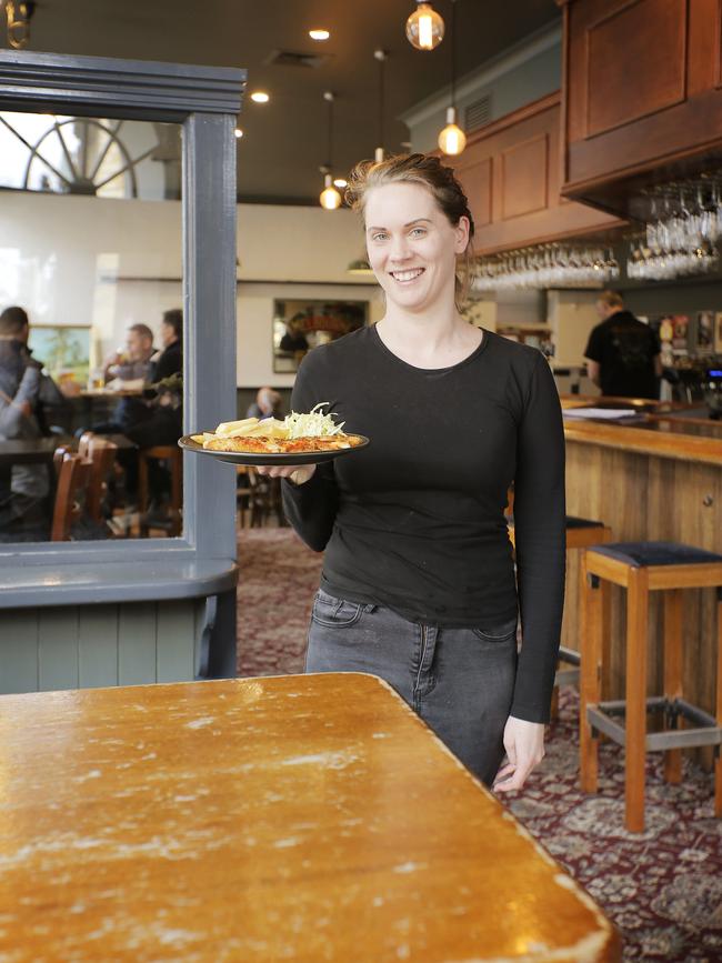 Serving up a parmigiana at Tom McHugo’s Hobart Hotel. Picture: MATHEW FARRELL