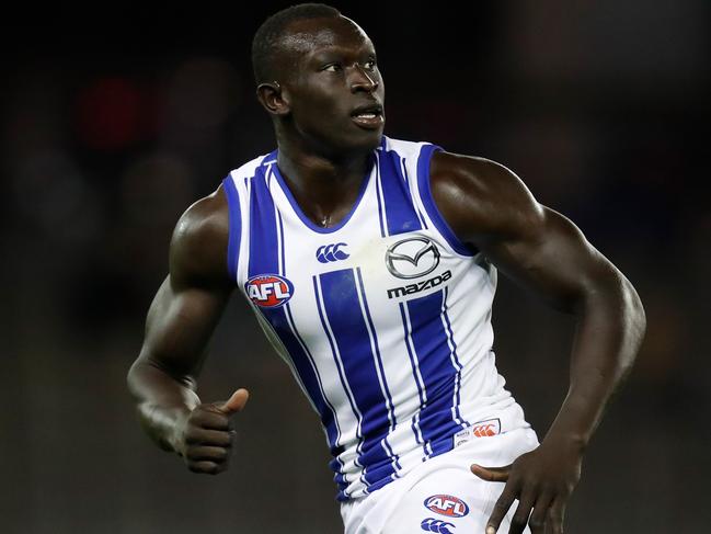 MELBOURNE, AUSTRALIA - FEBRUARY 21: Majak Daw of the Kangaroos in action during the 2020 Marsh Community Series match between the Western Bulldogs and the North Melbourne Kangaroos at Marvel Stadium on February 21, 2020 in Melbourne, Australia. (Photo by Michael Willson/AFL Photos via Getty Images)