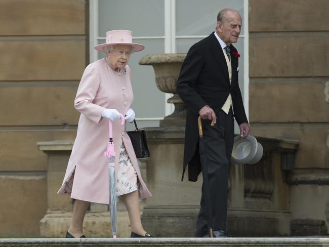 Queen Elizabeth II and Prince Phillip, Duke of Edinburgh at their garden party at Buckingham Palace on May 16, 2017 in London, England. Picture: Getty