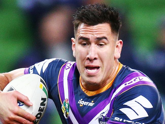 MELBOURNE, AUSTRALIA - AUGUST 17:  Nelson Asofa Solomona of the Storm runs with the ball through Nathan Brown of the Eels during the round 23 NRL match between the Melbourne Storm and the Parramatta Eels at AAMI Park on August 17, 2018 in Melbourne, Australia.  (Photo by Michael Dodge/Getty Images)