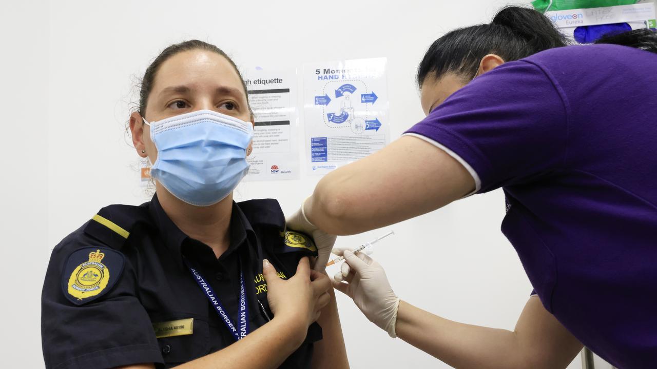 Australian Border Force worker Alysha Eyre receives a Covid-19 vaccination at Castle Hill Medical Centre.
