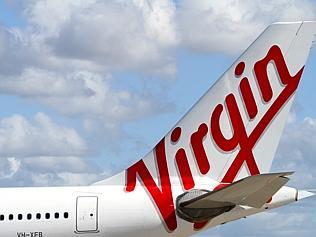 The new Virgin Australia logo on the tail of one of the Airbus A330 aircraft during announcement of rebranding from Virgin Bl...