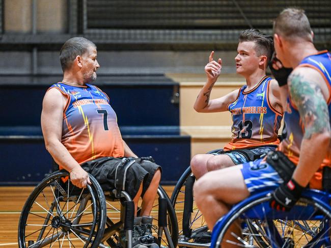 SunCity Wheelers founder Byron Holman (13, right) chats tactics with Andy Branson (7, left). Picture: Linda Bone Photographer