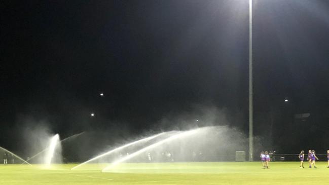 Sprinklers go on at Seaford ground during NAB League Girls match