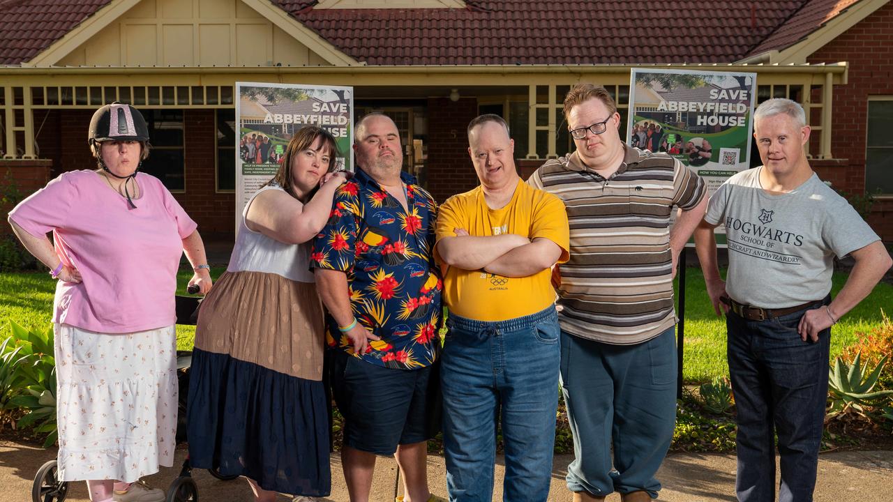 Abbeyfield residents Cara Williams, Sarah Byrne, Jacob Milbank, Brendan Stone, Philip Humphries and Stuart Lee at their home Marion Council wants to sell. Picture: Naomi Jellicoe
