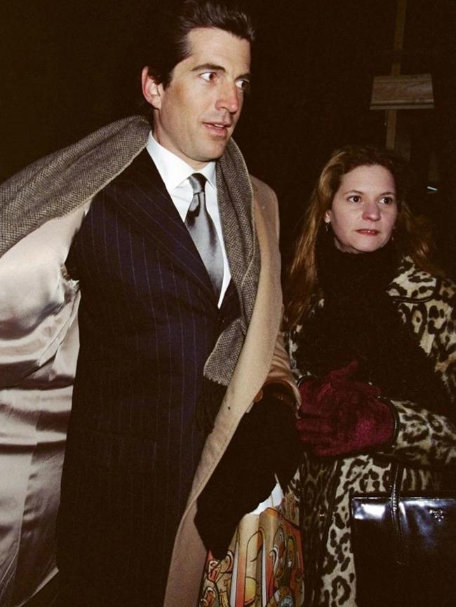 John F. Kennedy Jr. and RoseMarie Terenzio, pictured wearing Bessette-Kennedy's faux-leopard coat. Picture: Getty Images