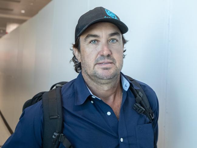 29/11/2022: Outback Wrangler Matt Wright walks to his flight at Sydney Airport. Picture: Liam Mendes / The Australian