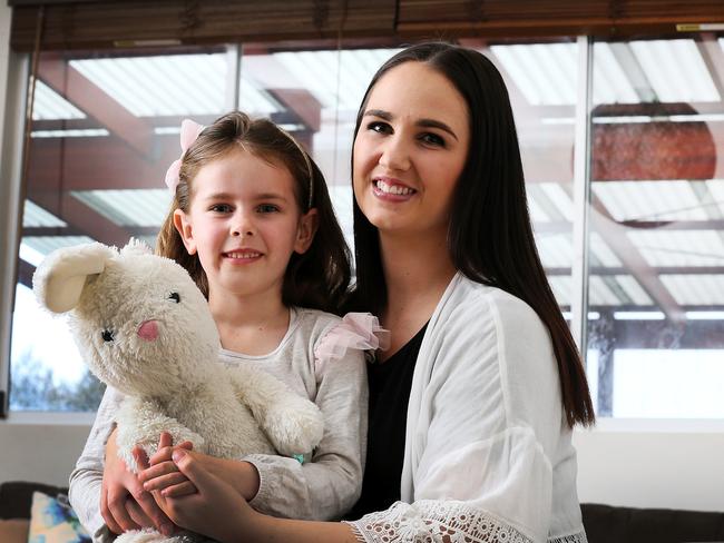 Nikita Palmer and her daughter Charlotte now. Picture: CHRIS KIDD