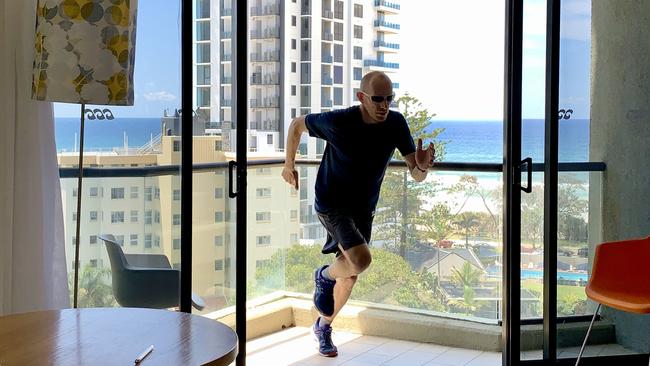 Dimitri Zafiriadis did a marathon while in his room in quarantine at QT Hotel on the Gold Coast. Picture: Supplied.