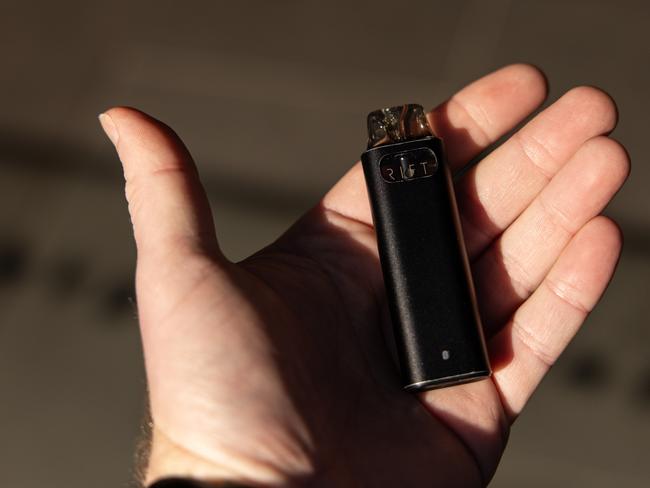 MELBOURNE, AUSTRALIA - NewsWire Photos - 18 AUGUST, 2024: A person hold a vape. Picture: NewsWire / Diego Fedele