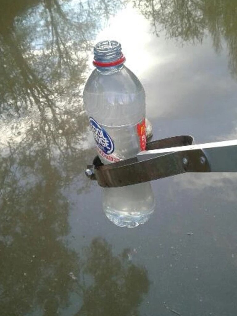 Polluted water in Tasmania's Plenty River on September 23 2020, collected by a local resident. Picture: Supplied