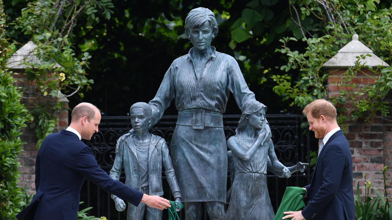 Prince William, Duke of Cambridge and Prince Harry, Duke of Sussex unveil a statue they commissioned of their mother Diana, Princess of Wales, in the Sunken Garden at Kensington Palace. Picture: Getty