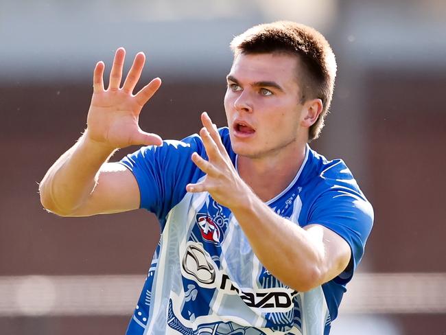 MELBOURNE, AUSTRALIA - FEBRUARY 22: Colby McKercher of the Kangaroos warms up before the 2025 AFL match simulation between the North Melbourne Kangaroos and Melbourne Demons at Arden Street on February 22, 2025 in Melbourne, Australia. (Photo by Dylan Burns/AFL Photos via Getty Images)