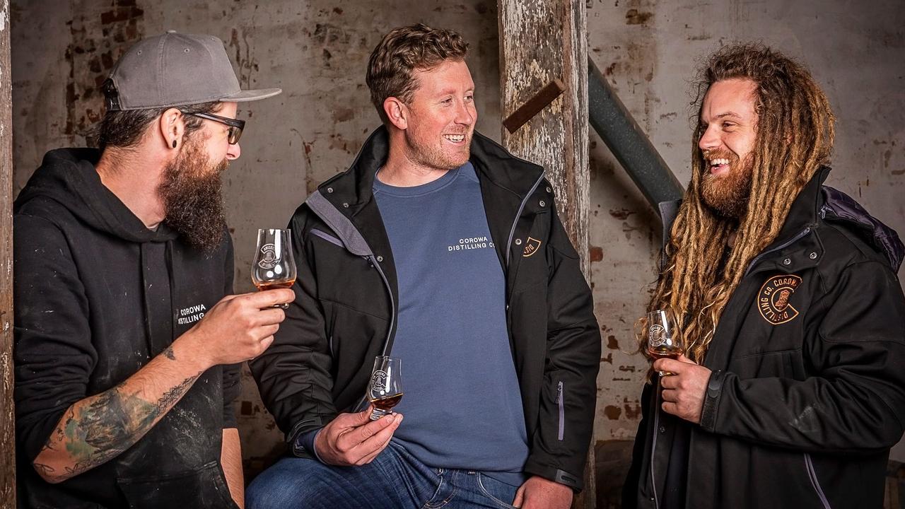 Corowa Distilling Co’s Managing Director Dean Druce (centre) with some of his team. Picture: Supplied