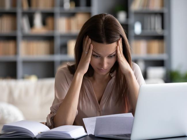 MONEY ISTOCK -  Stressed young woman holding head in hands, feeling desperate about financial problems, dismissive notice, failed test. Depressed businesswoman shocked by bank loan rejection, domestic bills. Picture: Istock