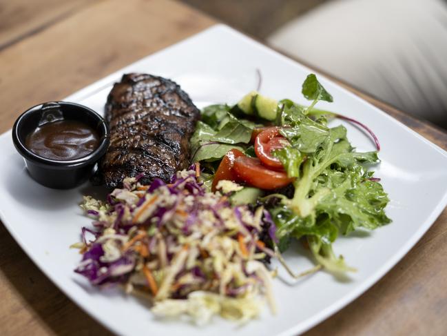 David Pocock cut out the carbs with slaw and salad on the side of his 300 gram Riverina rump steak. Picture: Martin Ollman