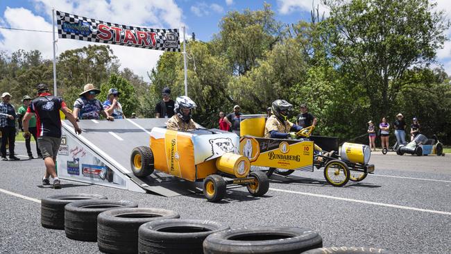 The Rum Runners race each other, Ben Priebbenow (left) and dad Scott Priebbenow, in the Greenmount Billy Kart Challenge, Saturday, November 23, 2024. Picture: Kevin Farmer