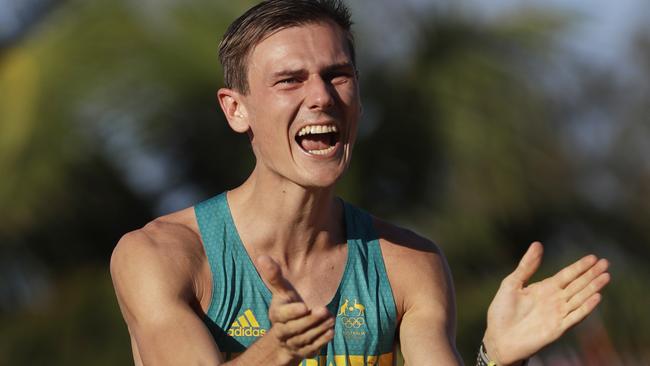 Dane Bird-Smith celebrates after his gruelling race. Picture: AP