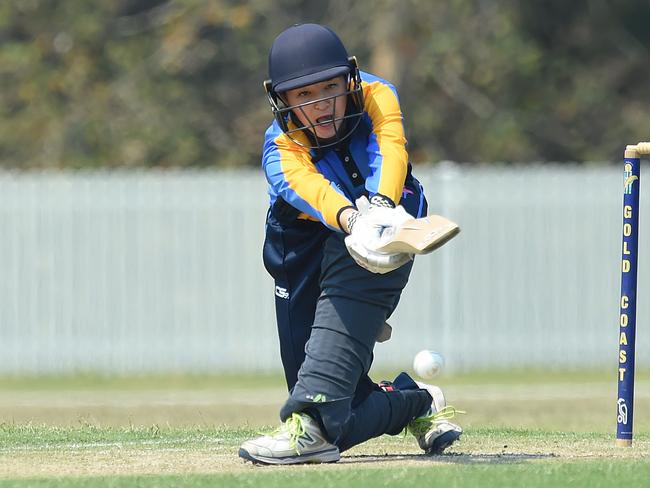 Chelsea Gan bats for the Gold Coast Dolphins’ women in Sunday’s win over UQ. Picture: Lawrence Pinder