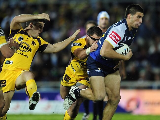 <p>NRL Round 15 - Broncos v Cowboys: James Tamou of the Cowboys breaks the Broncos defence.</p>