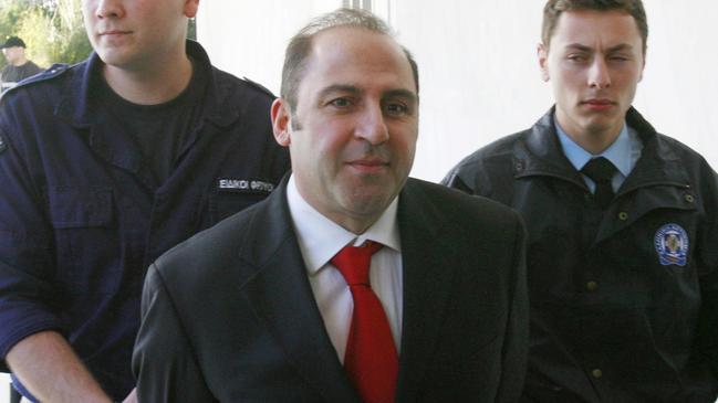 Tony Mokbel in his red tie.