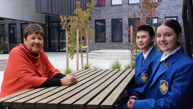 Ms Wyngaard said her students are often shocked to learn about her struggles in apartheid-era South Africa. She is pictured here with Year 7 students Robert Martin and Nicky Terzakis. Picture: Supplied