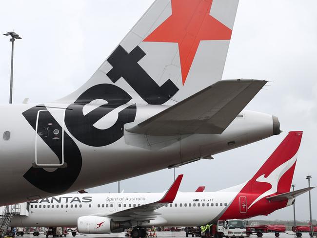 A Jetstar Airbus A380 and Qantas Boeing 737-800  jet aircraft at Cairns Airport after touchdown, bringing tourists and tourism dollars to Far North Queensland. Picture: Brendan Radkeescape december 6 2020 doc holiday