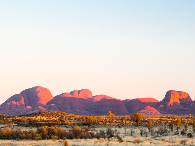 ESCAPE:  Uluru, AUSTRALIA - July 5, 2015: The Olgas at sunrise on a clear winter's morning in the Northern Territory, Australia Picture: Istock