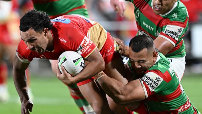 BRISBANE, AUSTRALIA - JULY 11: Trai Fuller of the Dolphins is tackled during the round 19 NRL match between Dolphins and South Sydney Rabbitohs at Kayo Stadium, on July 11, 2024, in Brisbane, Australia. (Photo by Bradley Kanaris/Getty Images)