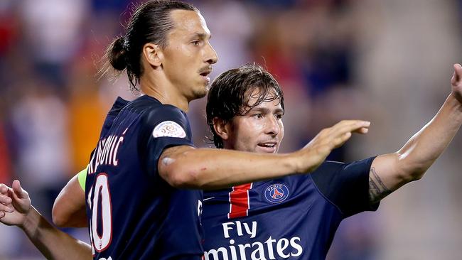 Zlatan Ibrahimovic is congratulated by teamamte Maxwell after scoring in the second half.