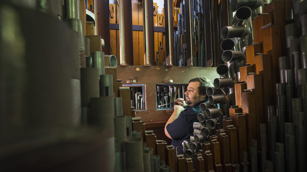 Lachlan Pierce of Pierce Pipe Organs is carrying on the work his father started more than 20 years ago to restore, maintain and tune the 1907 Norman and Beard Pipe organ at St Luke's Anglican Church, Friday, May 17, 2024. Picture: Kevin Farmer