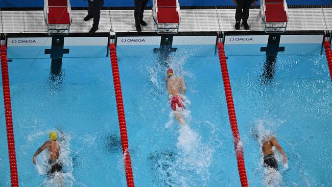 An overview shows China's Pan Zhanle winning this morning’s final. Picture: Manan Vatsyayana/AFP