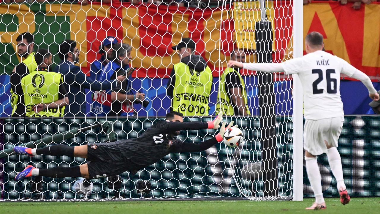 Costa saved all three of Slovenia’s penalties in the shootout. (Photo by Kirill KUDRYAVTSEV / AFP)