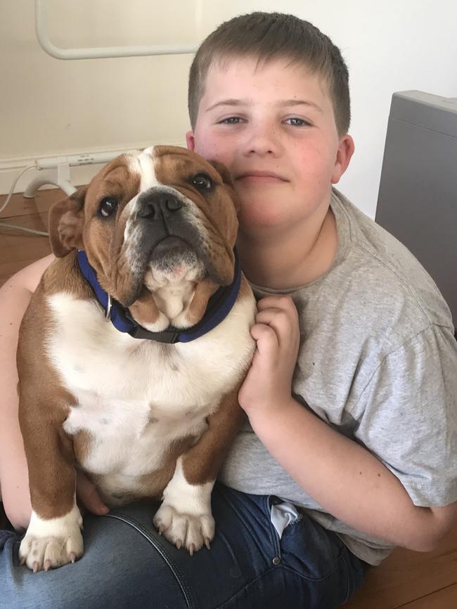 Ten-year-old Connor O'Neill, pictured with his dog Atticus Finch, has been a vegetarian for two years.