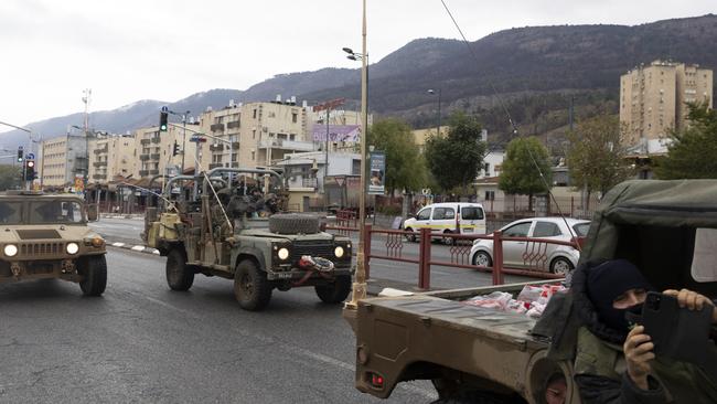 Israeli Army vehicles in the Israeli border city of Kiryat Shmona following the ceasefire agreement. Picture: Getty Images.