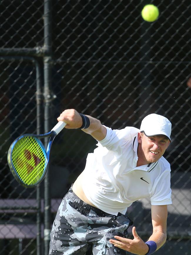 Harry Bourchier serves during the semi finals of the Victorian grass court championships at Geelong Lawn Tennis Club in Belmont. Picture: ALAN BARBER