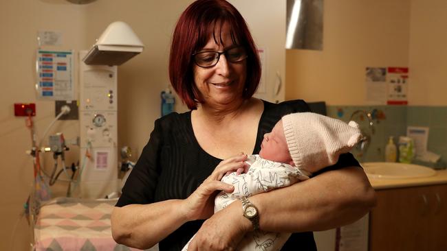 Midwife Linda Campbell with newborn Ivy Dolman at the Lyell McEwin Hospital. Picture: Calum Robertson