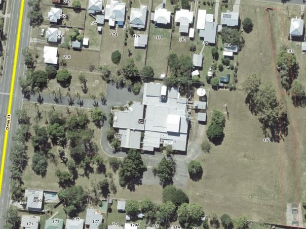 An aerial image from 2017 when the WIN TV studio buildings were still on the site.