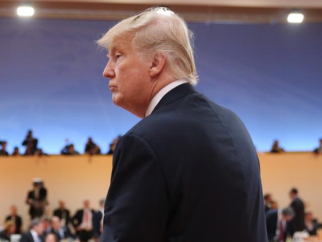 HAMBURG, GERMANY - JULY 08:  U.S. President Donald Trump arrives for the morning working session on the second day of the G20 economic summit on July 8, 2017 in Hamburg, Germany. G20 leaders have reportedly agreed on trade policy for their summit statement but disagree over climate change policy.  (Photo by Sean Gallup/Getty Images)