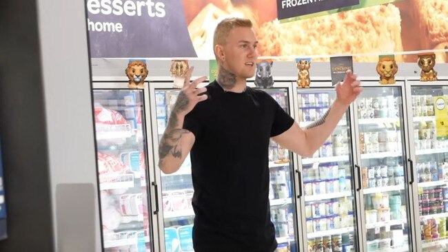 Luke Erwin pictured filming one of his stunts in a Woolworths. Picture: YouTube