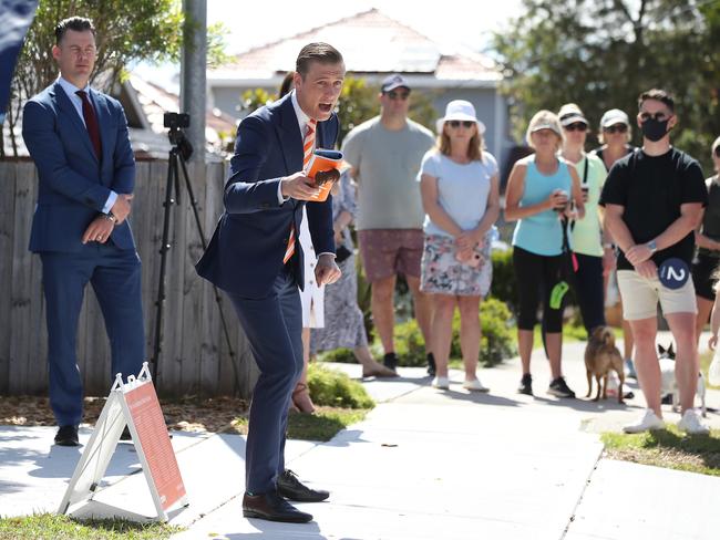 WEEKEND TELEGRAPH SPECIAL, NOVEMBER 6, 202. Saturday auction at 34 Dwyer Ave, Little Bay with the house selling above reserve. The auction drew a decent crowd with about 3 main bidders. Picture: David Swift