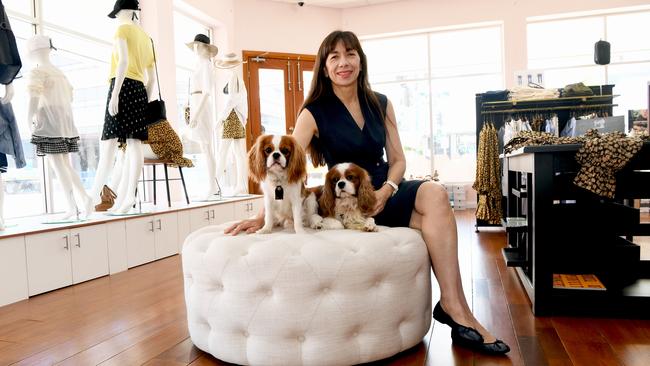 Business woman Darlene Chin with her pooches Jim and Billy. Picture: Katrina Bridgeford.