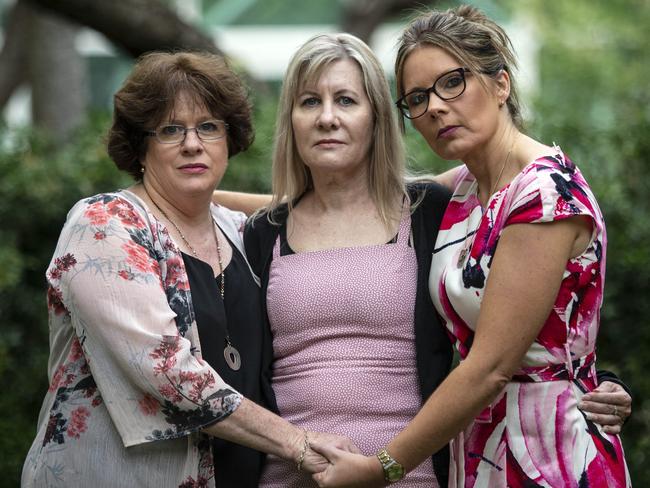 Mothers Colleen Pillen, Julie-Ann Finney and Nikki Jamieson held framed pictures of their veterans sons who took their life. Picture Gary Ramage