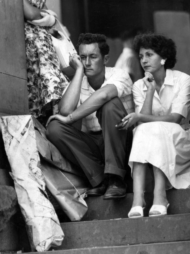 Christmas shopping on December 22 in 1960 and these two faces say it all.