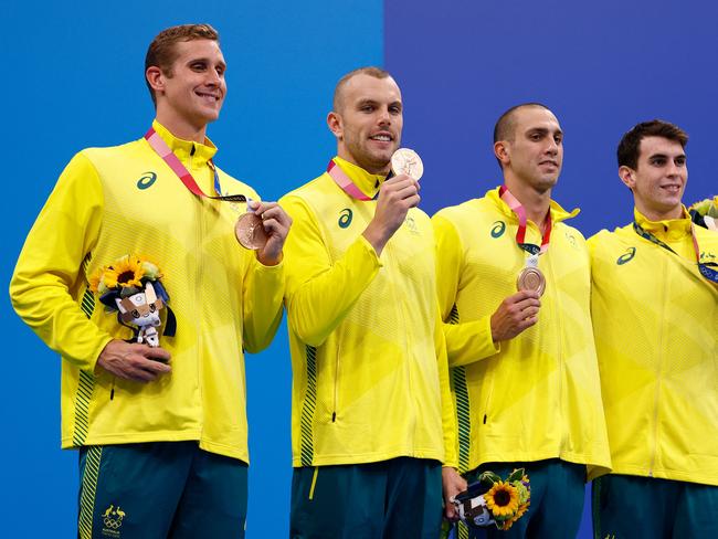 Alex Graham (far left) receiving his bronze medal with Australian teammates Kyle Chalmers, Australia's Zac Incerti and Australia's Thomas Neill at the Tokyo 2020 Olympic Games. Picture: AFP