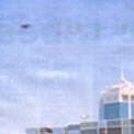 UFO above Cavill Avenue unknowingly snapped by a New Zealnd tourist in 1998.