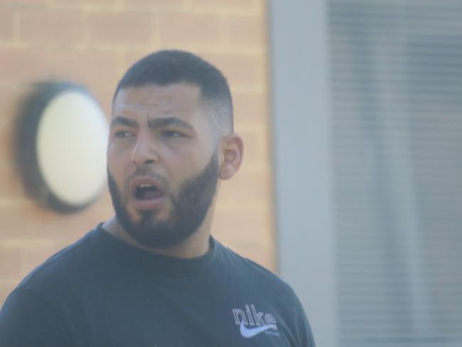 Madyn 'Mick' Kassem, 29, of Granville, leaving Wyong Local Court where he pleaded guilty to intimidation, aggravated enter dwelling and demanding property with menaces after he tried to evict a guest at The Entrance Motel. Picture: NewsLocal